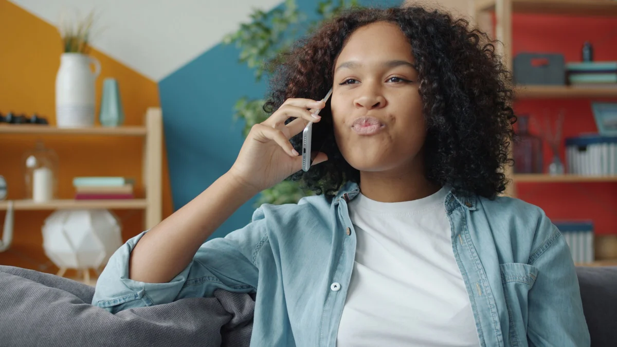 A woman getting in touch by phone from home — illustration