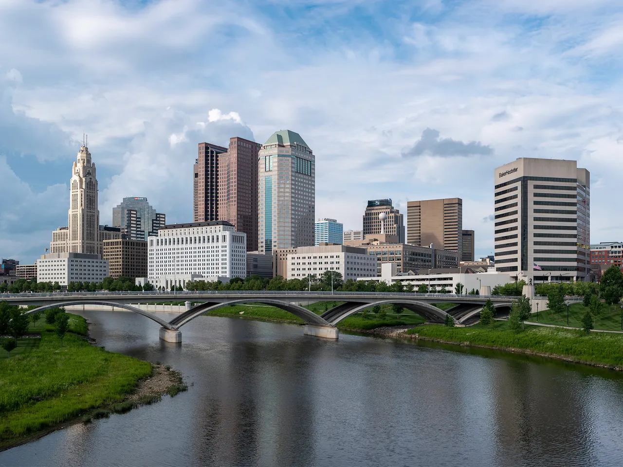 Downtown Columbus and the LeVeque Tower beyond the Rich Street Bridge over the Scioto River